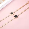 Roségold Armband - schwarzer runder Anhänger mit römischen Ziffern