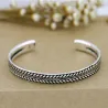 Stainless steel bracelet - with leaf pattern - open design - unisexBracelets