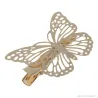 Haarspange mit goldenem Schmetterling