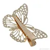 Haarspange mit goldenem Schmetterling