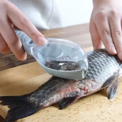 Fischreinigung - Schuppenwerkzeug abkratzen