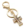 Keyring with a crystal crossKeyrings