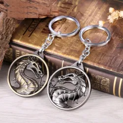 Runder Schlüsselanhänger aus Metall mit Drachen