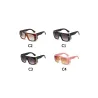 Trendige große Sonnenbrille - getönt - mit goldener Metallverzierung - Unisex