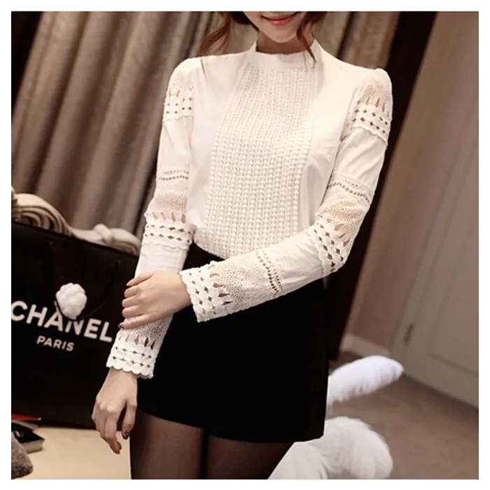 Elegante weiße Bluse mit langen Ärmeln - ausgehöhlte Spitze