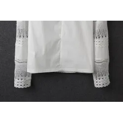 Elegante weiße Bluse mit langen Ärmeln - ausgehöhlte Spitze