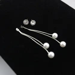 Elegante lange Ohrringe mit Perlen / Kristall