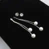 Elegante lange Ohrringe mit Perlen / Kristall