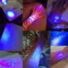 Kugelschreiber mit unsichtbarer Tinte - mit UV-Licht