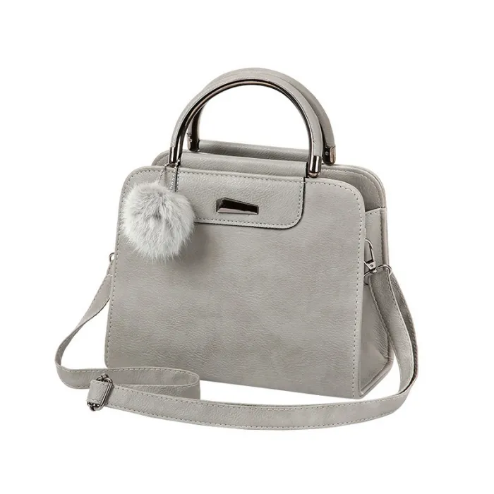 Vintage handbag - with shoulder strap - fur pom pom - leatherHandbags