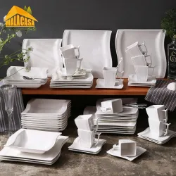 Elegant tableware - white porcelain dinner set - cups - saucers - platesCutlery