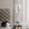Moderne goldene Wandlampe - S-förmig