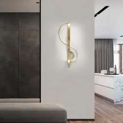 Moderne goldene Wandlampe - S-förmig