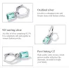Unregelmäßige lange Ohrringe - quadratischer grüner Zirkon - 925er Sterlingsilber