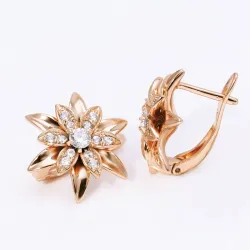 Goldene Blumenohrringe mit Kristallen