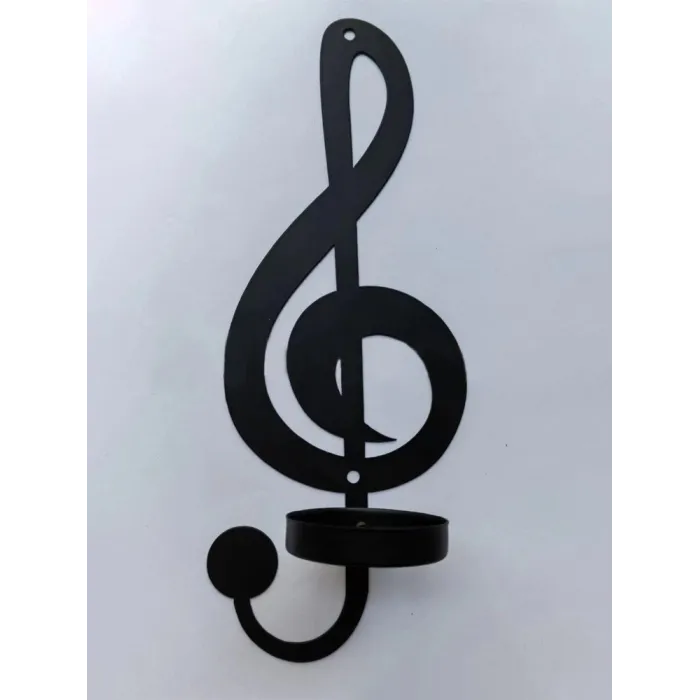 An der Wand befestigter Kerzenhalter - schwarze Musikanmerkungen