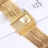 Luxuriöse Quarzuhr mit Kristallen - breites Goldarmband