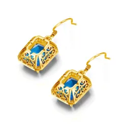 Goldene Ohrringe mit blauem Kristalltopas / Strasssteinen