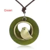 Wooden pendant with bird - rope necklaceNecklaces