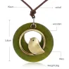 Wooden pendant with bird - rope necklaceNecklaces