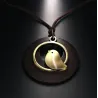 Wooden pendant with bird - rope necklaceNecklaces