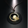 Wooden pendant with bird - rope necklaceNecklaces