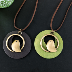 Wooden pendant with bird - rope necklaceNecklaces