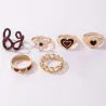 Ringe im Retro-Stil - braune Blumen / Herzen - 6 Stück