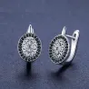 Elegante runde Silberohrringe - weiße / schwarze Kristalle