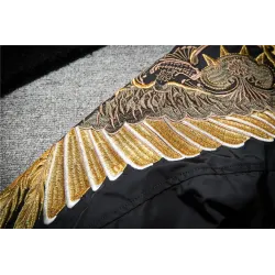 Black bomber jacket with embroidered golden wingsJackets