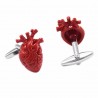 Trendy cufflinks with a red heart