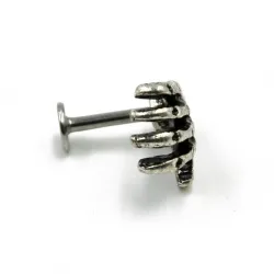 Körper Piercing mit Totenkopf Hand
