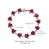 Gold & silver bracelet with red rosesBracelets