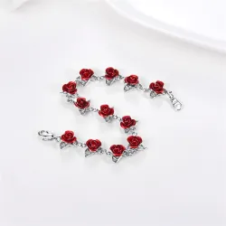 Gold & silver bracelet with red rosesBracelets