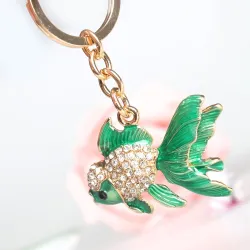 Crystal with gold fish - keychainKeyrings
