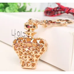 Gold crystal perfume bottle - keychainKeyrings
